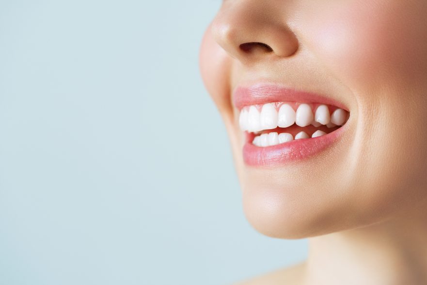 Perfect healthy teeth smile of a young woman.